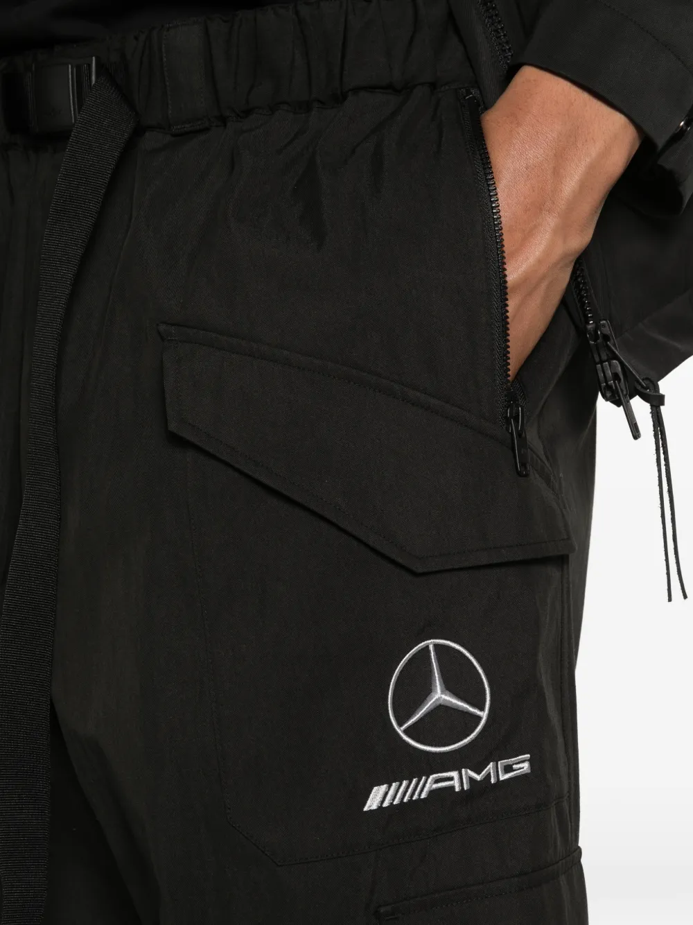 Close up of balck pant, showing texture of the cotton fabric