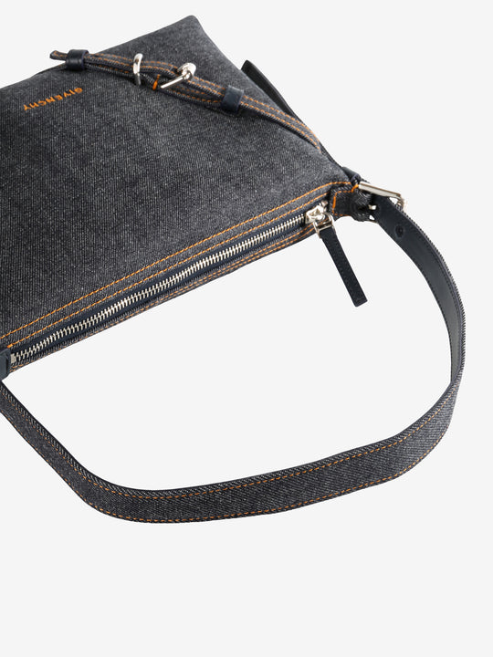 Close up of blue bag, showing texture of the cotton fabric