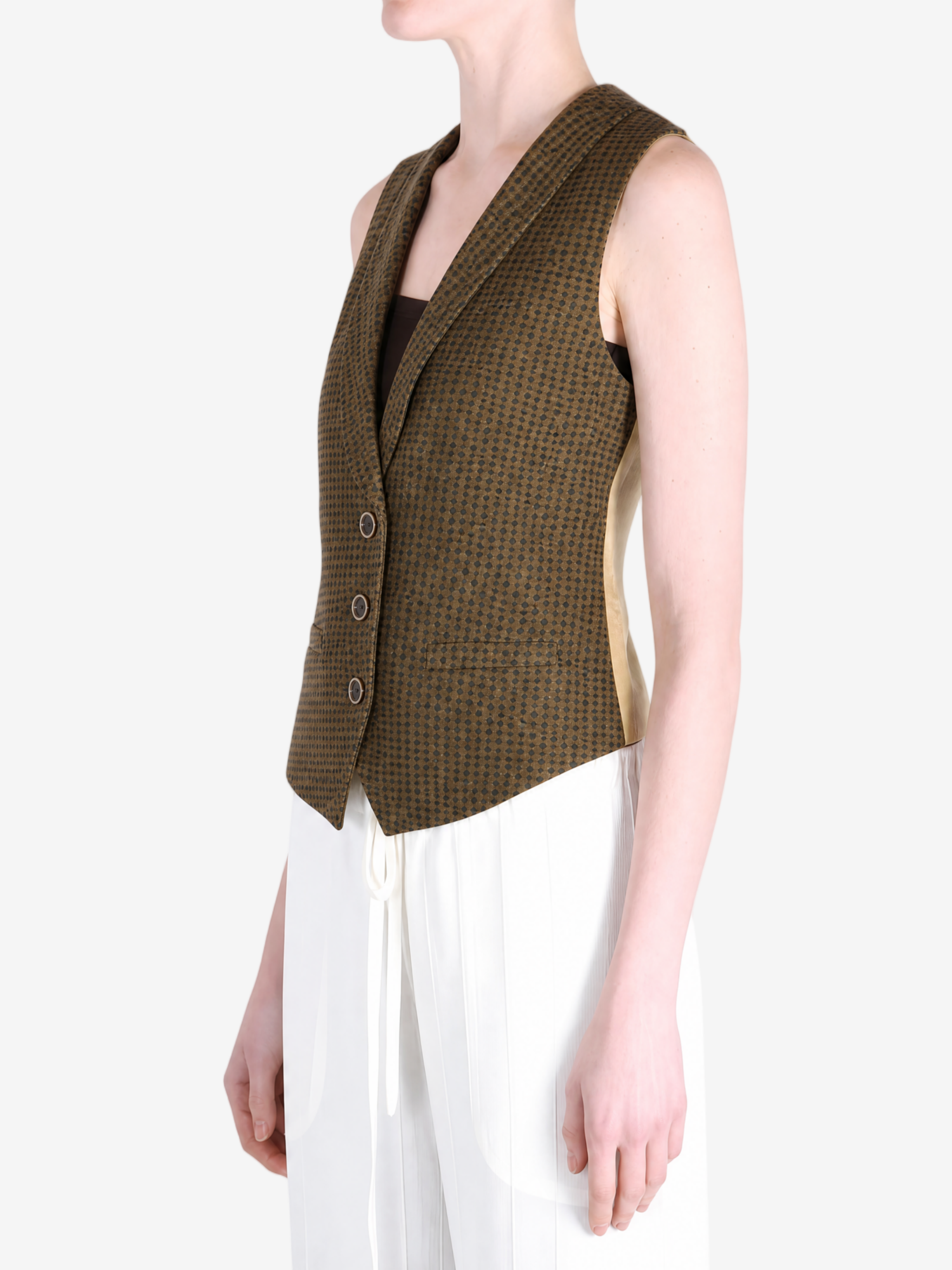 Green tops worn a person,showing the tops fit