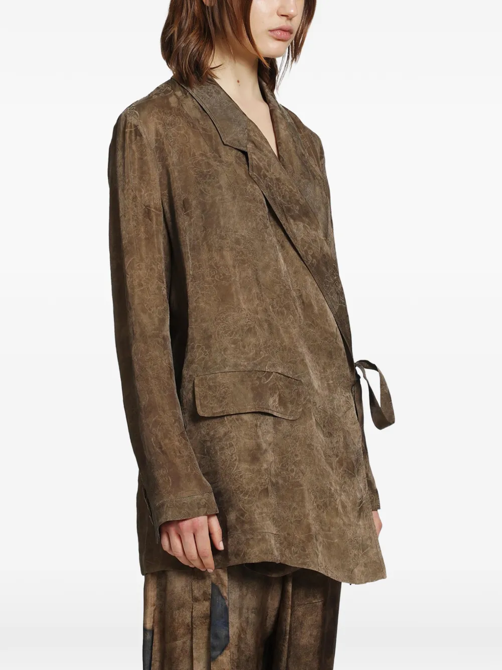 Brown jacket-coat worn by a person, showing the jacket-coat's fit