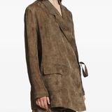 Brown jacket-coat worn by a person, showing the jacket-coat's fit