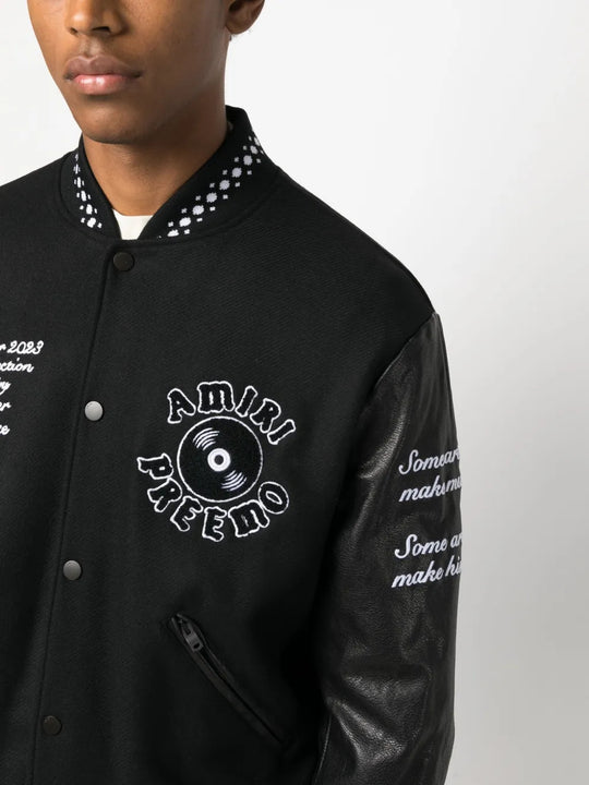 Black jacket worn by a person, showing the jacket fit