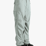 Grey pant worn by a person, showing the pant's fit