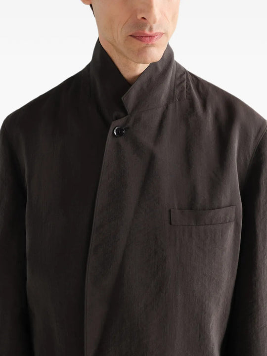 Brown jacket worn by a person, showing the jacket fit