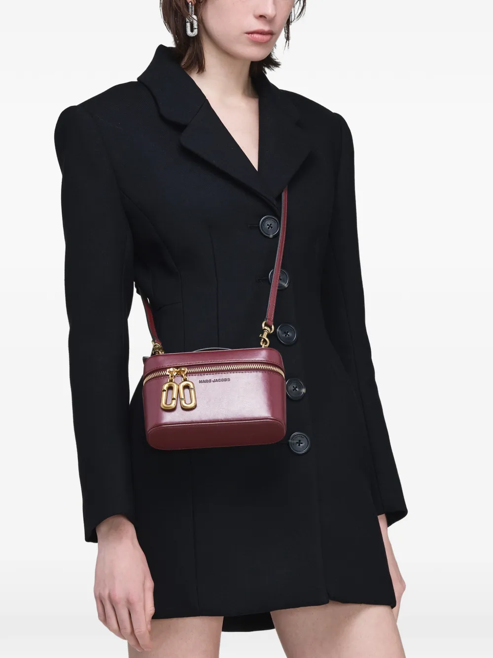 Red bag worn by a person, showing the red bag's fit