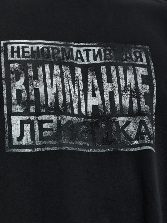 Close up of Black t-shirt, showing texture of the 100% cotton fabric