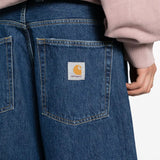 Close up of blue pants, showing texture of the cotton fabric