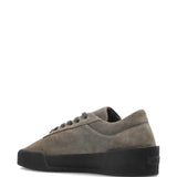 Grey sneakers, back view