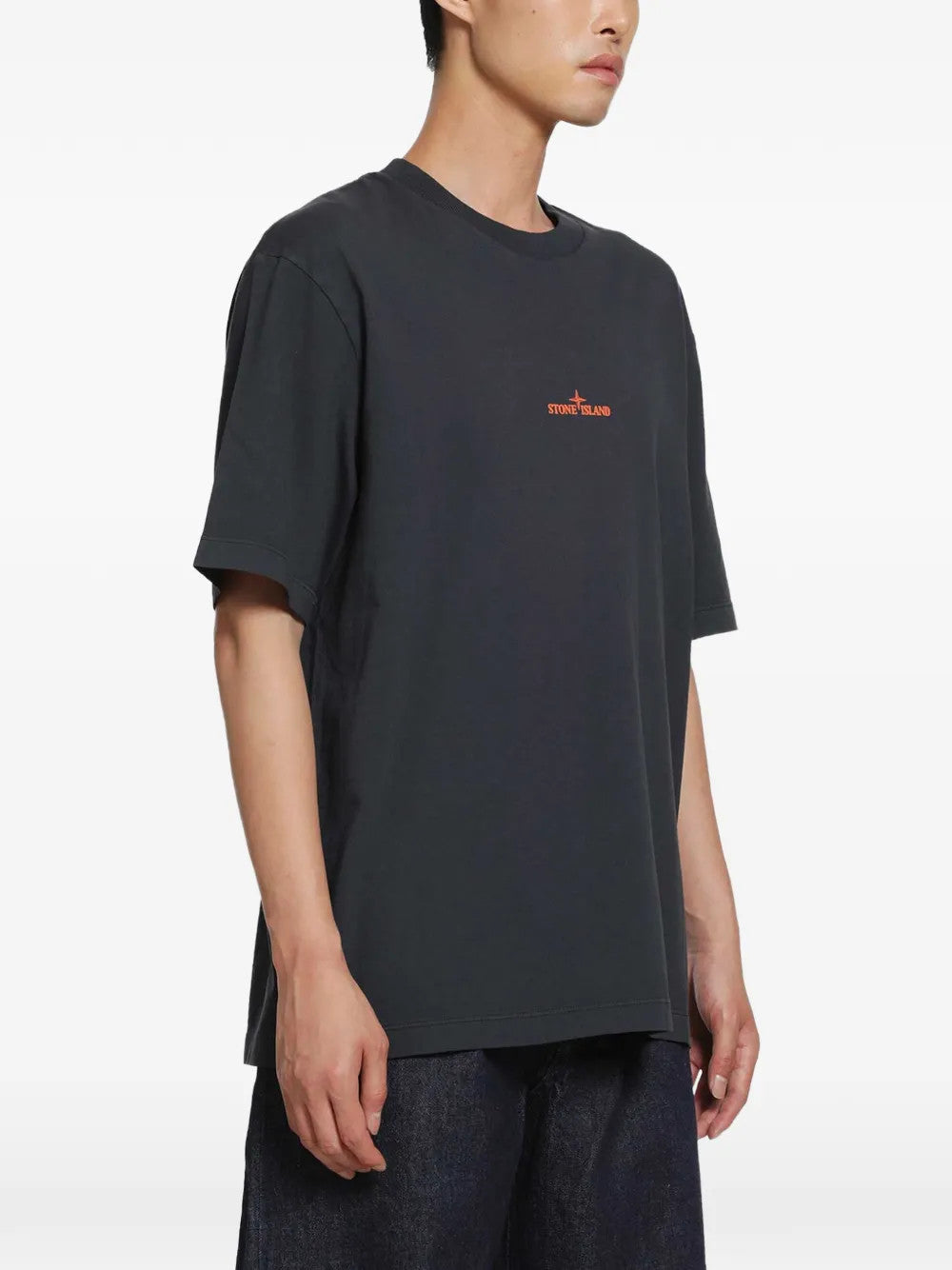 Navy t-shirt worn by a person, showing the t-shirt fit