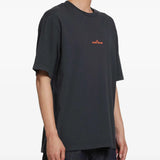 Navy t-shirt worn by a person, showing the t-shirt fit