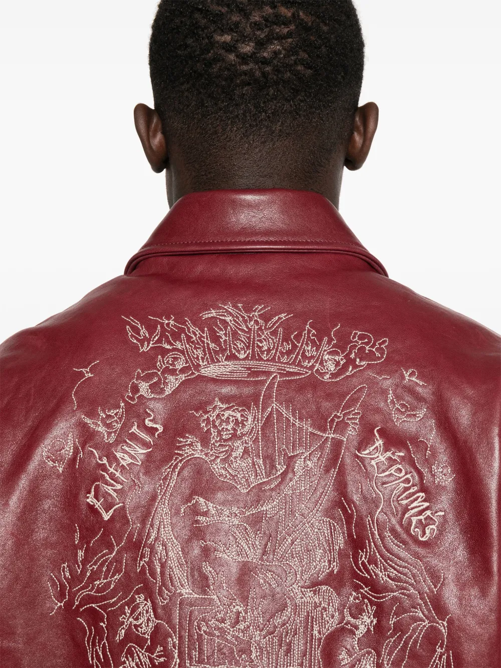 Close up of the red jacket, showing texture of the calf leather
