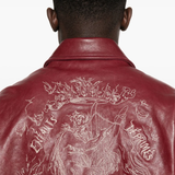 Close up of the red jacket, showing texture of the calf leather