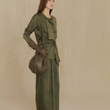 Green pants, full body view