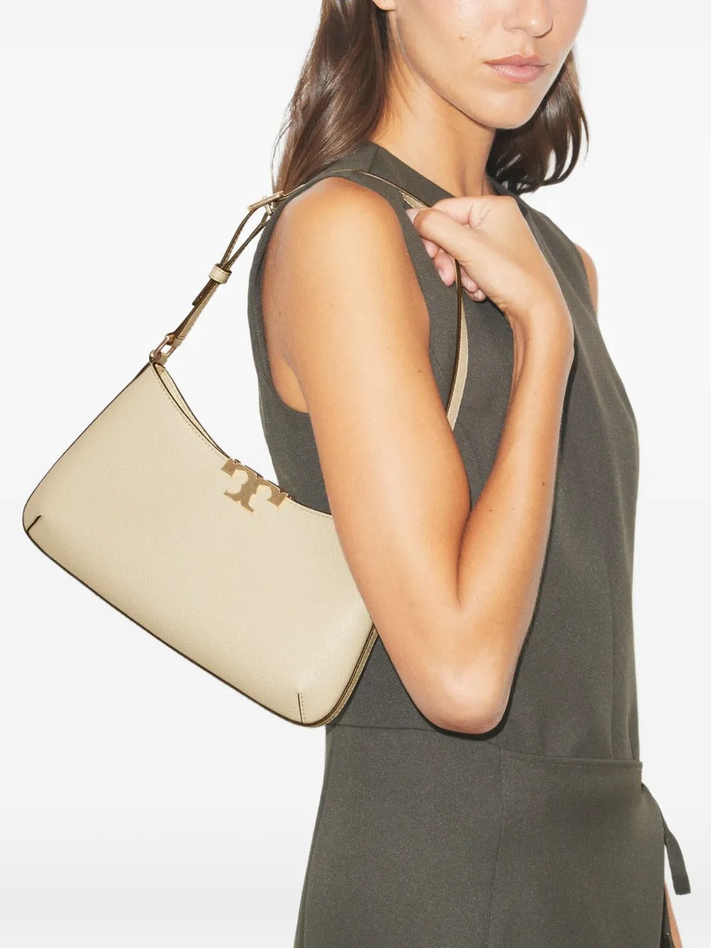 Tan bags worn by a person, showing the bags fit