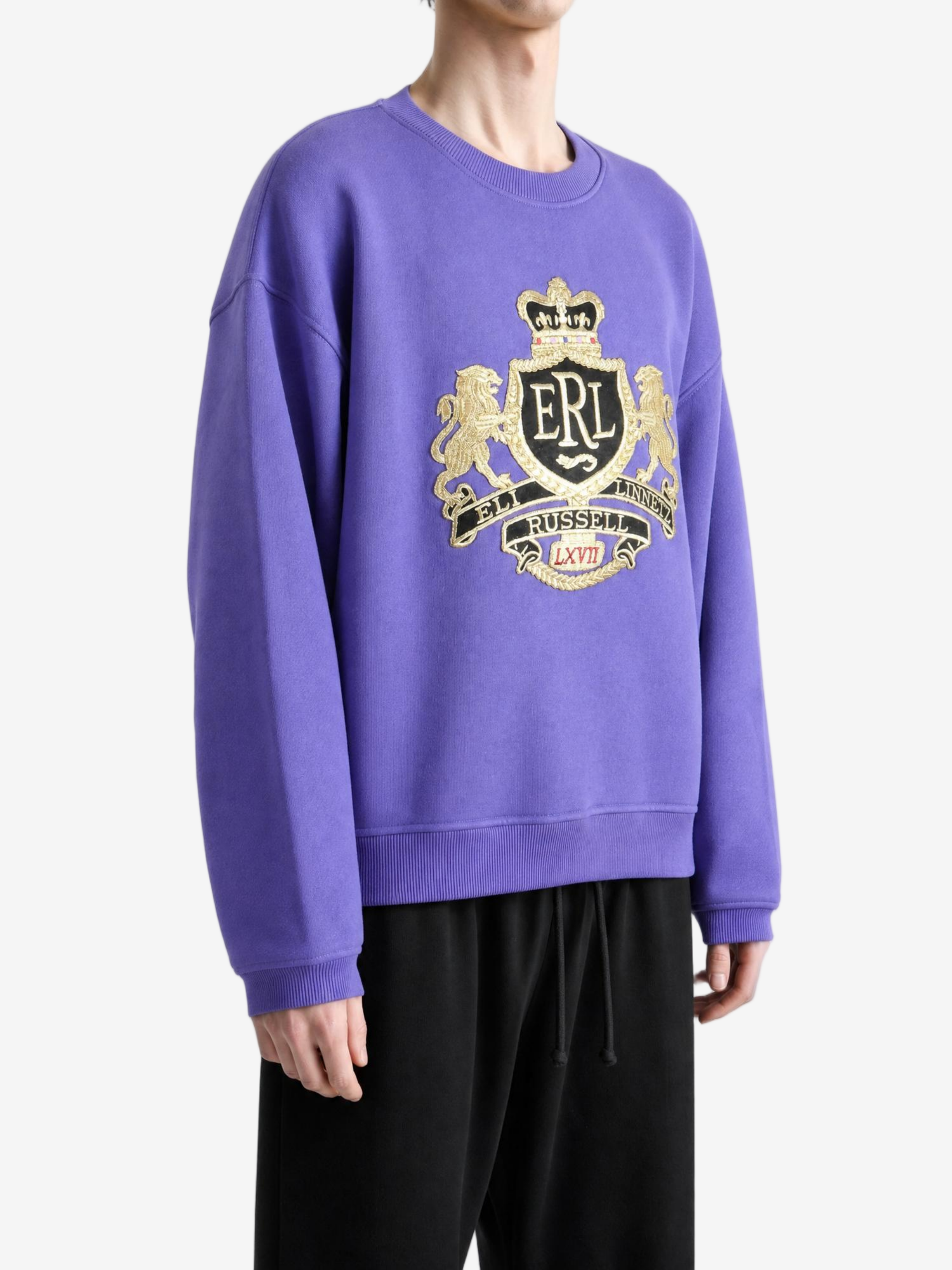 Purple top worn by a person, showing the top fit
