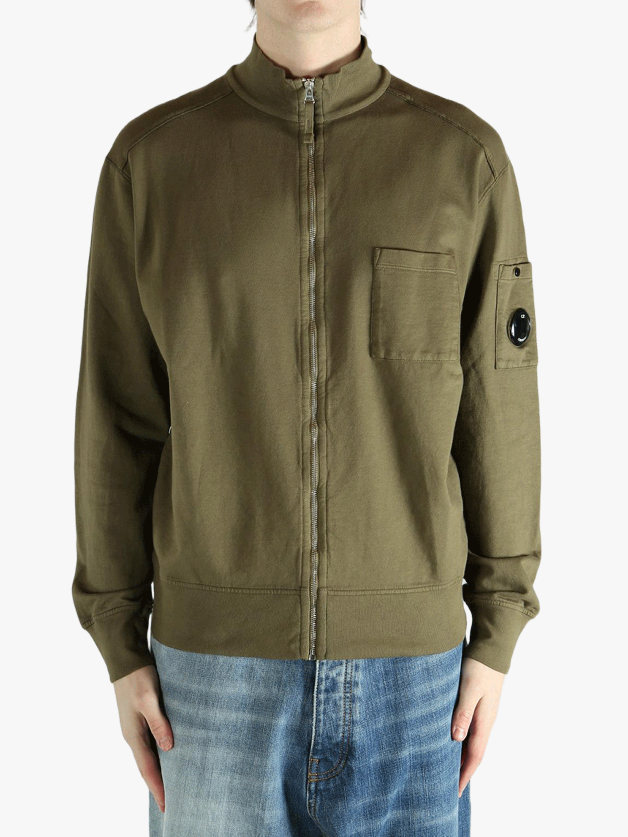 Green jacket worn by a person,showing the jacket fit