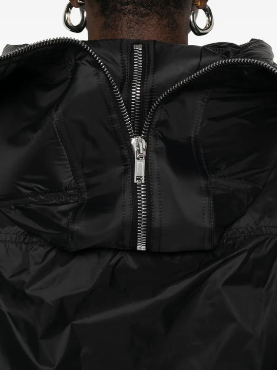 Close up of the black jacket, showing texture of the nylon fabric