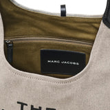 Close up of the white bag, showing texture of the cotton fabric