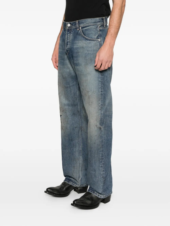 Blue jeans worn by a person, showing the jeans fit