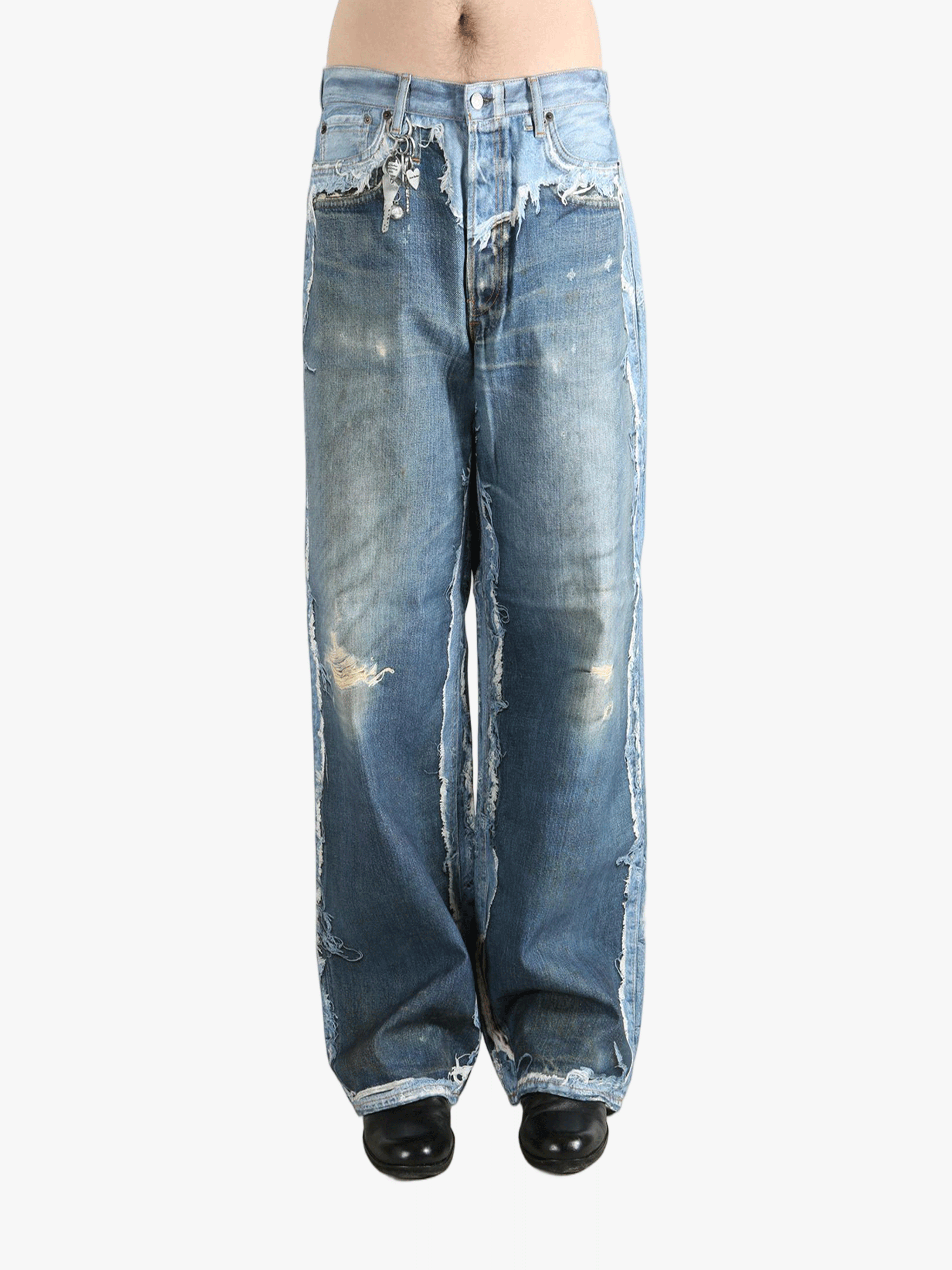 Blue jeans worn by a person, showing the jeans fit