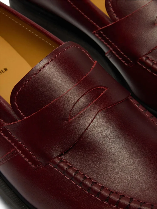 Close up of Burgundy shoes, showing detail