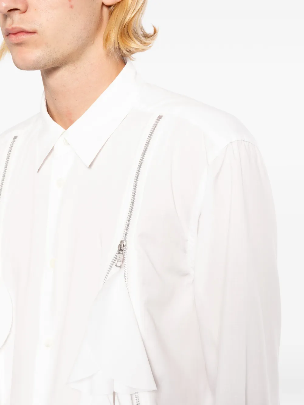 White shirt worn by a person, showing the shirt fit