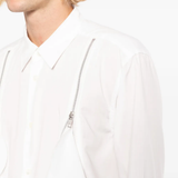 White shirt worn by a person, showing the shirt fit