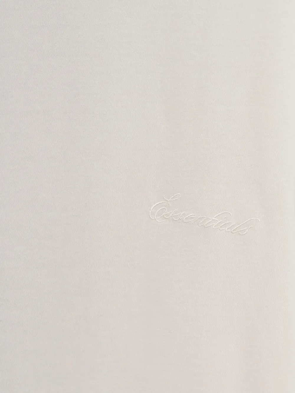 Close up of white t-shirt, showing texture of the Cotton fabric