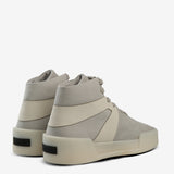 Grey sneakers, back view