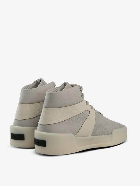 Grey sneakers, back view