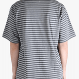 Grey t-shirt worn by a person, showing the t-shirt fit