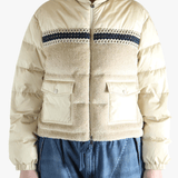 Tan jacket worn by a person, showing the jacket's fit