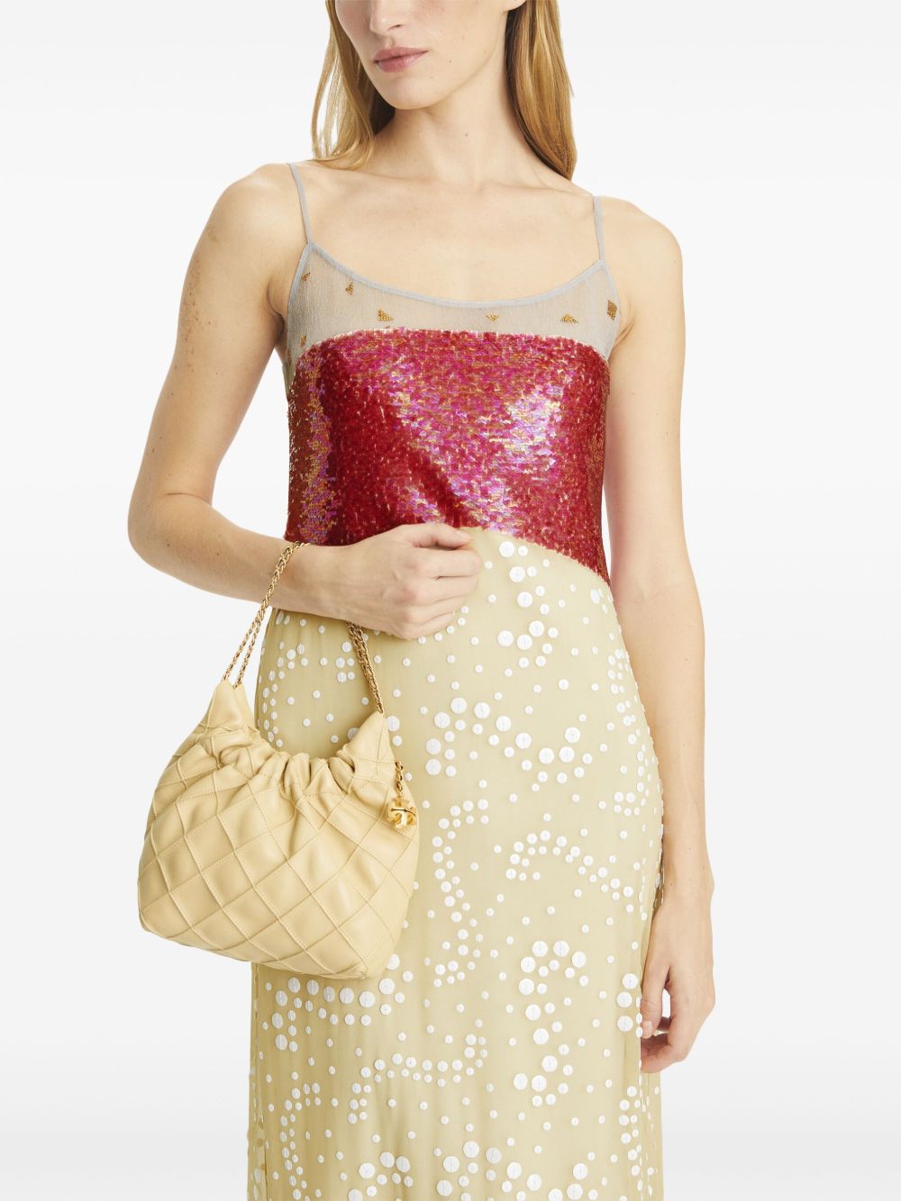 Yellow bags worn by a person, showing the bags fit