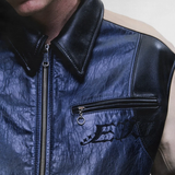 Navy jacket worn by a person, showing the jacket fit