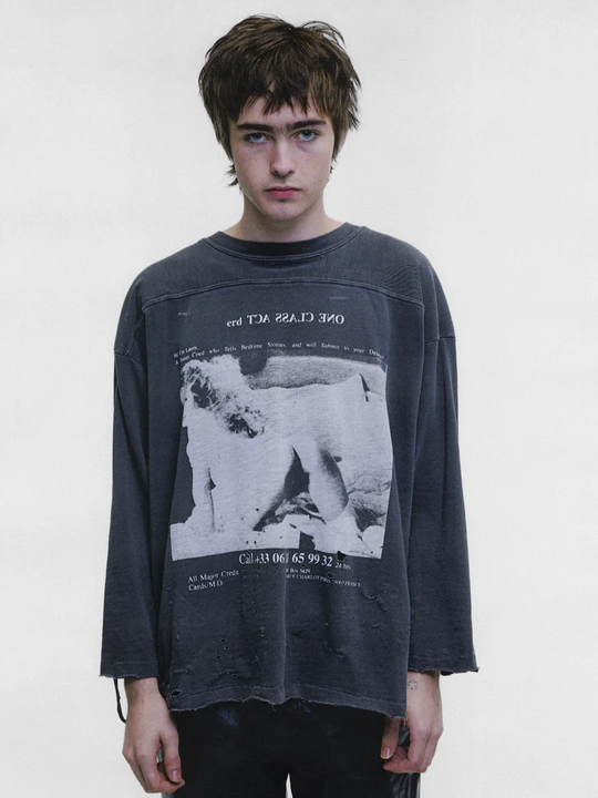 Grey shirt worn by a person, showing the shirt fit