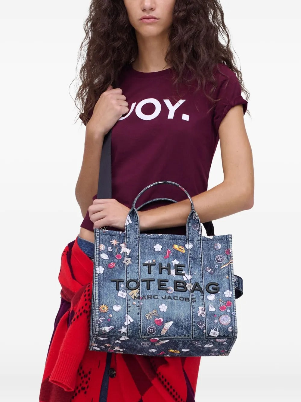 Blue bags worn by a person, showing the bags fit