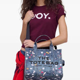 Blue bags worn by a person, showing the bags fit