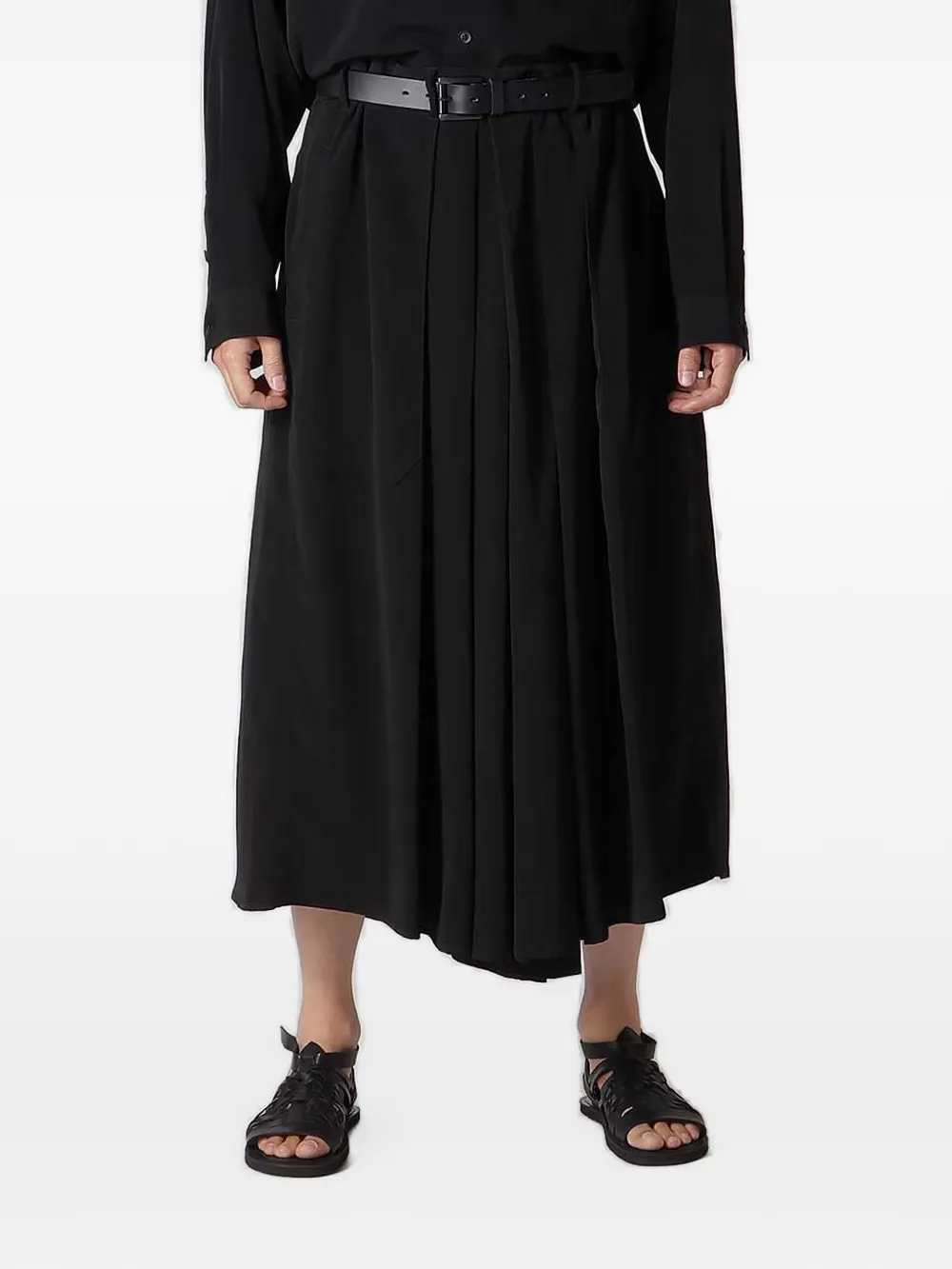 black pants,worn by a person, showing the pants fit