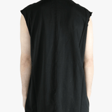 Black t-shirt worn by a person, showing the t-shirt fit