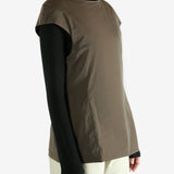 Brown dress worn by a person, showing  the dress's fit