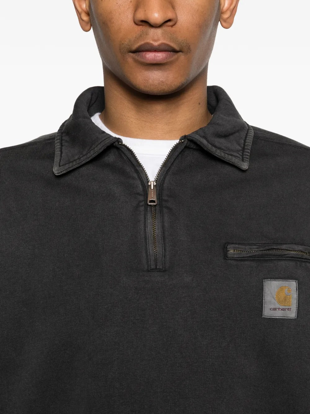 Close up of the black sweats, showing texture of the cotton fabric