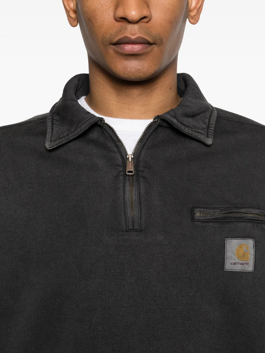 Close up of the black sweats, showing texture of the cotton fabric