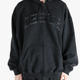 Black hoodie worn by a person, showing the hoodie fit