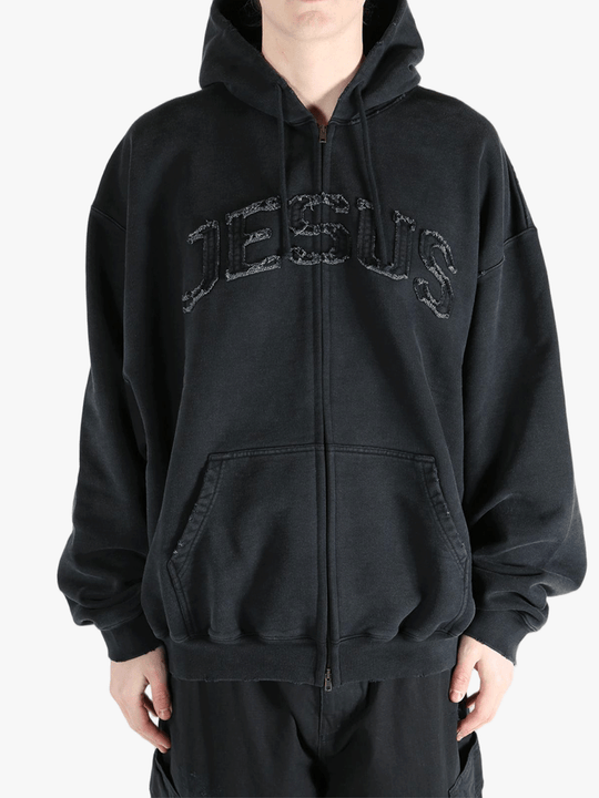 Black hoodie worn by a person, showing the hoodie fit