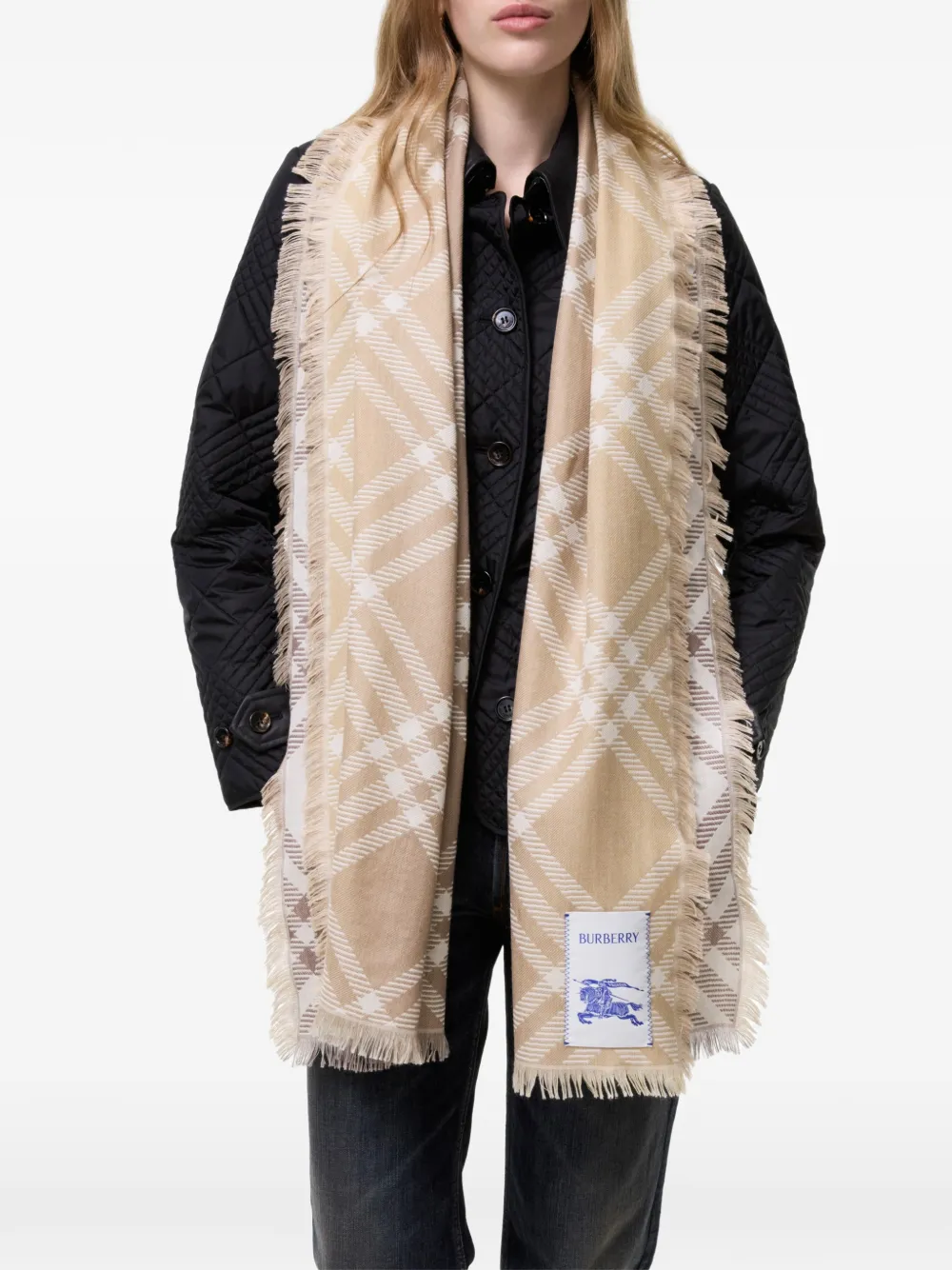 Brown scarf worn by a person, showing the scarf fit