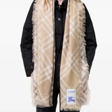 Brown scarf worn by a person, showing the scarf fit