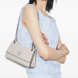 Grey bag worn by a person, showing the bag fit