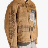 Brown jacket worn by a person, showing the jacket's fit