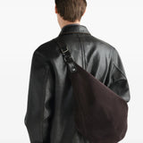 Brown bag worn by a person, showing the bag fit