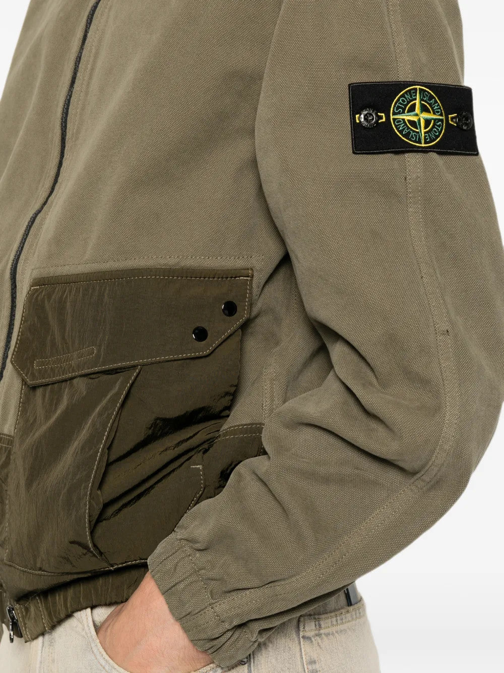 Green shirt worn by a person, showing the shirt fit